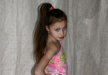 small girl in shorts