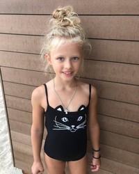 small girl in shorts