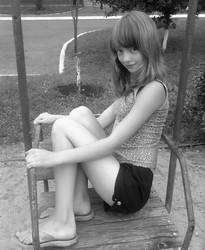 small girl in shorts